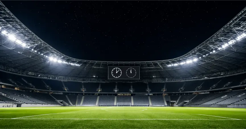 Stadio di calcio illuminato con orologio e calendario stilizzato